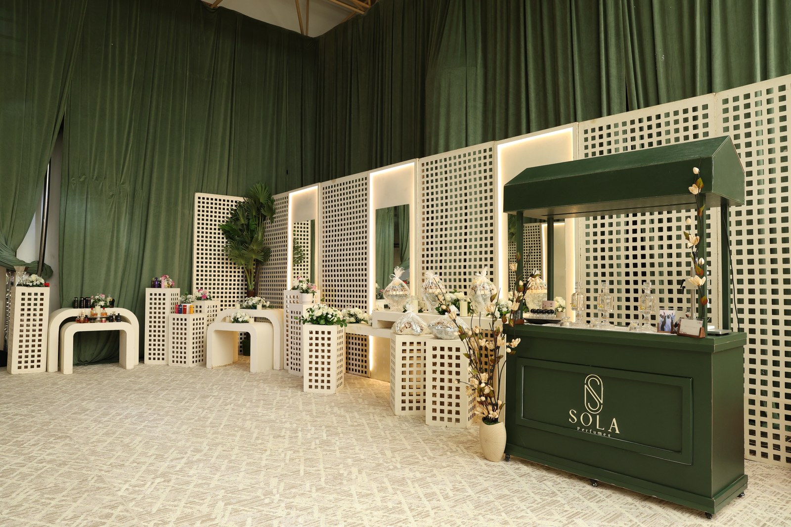 Banquet table setting with refined floral arrangements